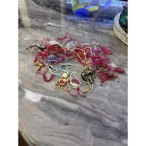 Lot of String Charm Bracelets